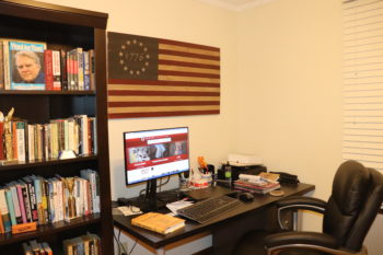 hanging american flag office - humor column