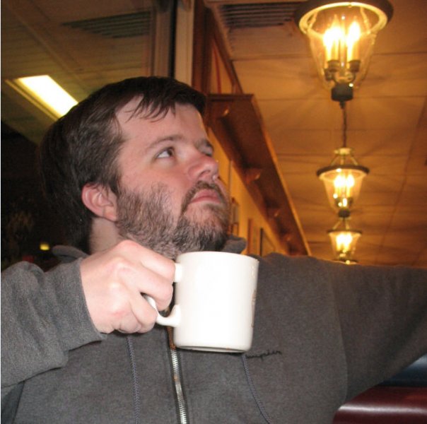 Drinking a cup of coffee in a diner